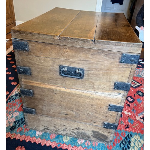 44 - A metal bound oak trunk with metal drop handles to each side and two lift out interior trays. 78cm w... 