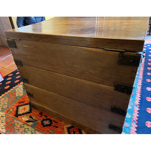 44 - A metal bound oak trunk with metal drop handles to each side and two lift out interior trays. 78cm w... 