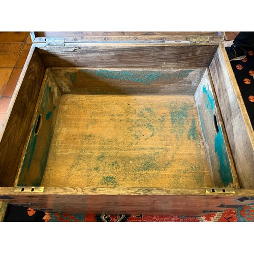 44 - A metal bound oak trunk with metal drop handles to each side and two lift out interior trays. 78cm w... 