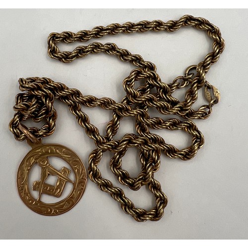 439 - A 9 carat gold Masonic pendant on 9 carat gold chain. Total weight 6.1gm. Chain 47cm long.