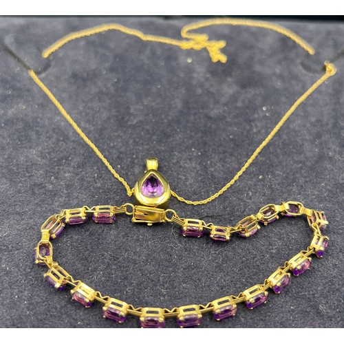 443 - A 9 carat gold and amethyst pendant on 9 carat gold chain, length 44cm, together with an amethyst an... 