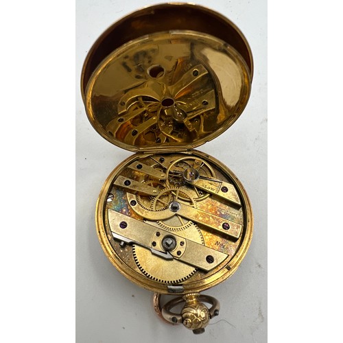 523 - An 18 carat gold pocket watch, stamped W. Wood and Sons Genève 18k. Weight 48.1 gm. 4cm d.