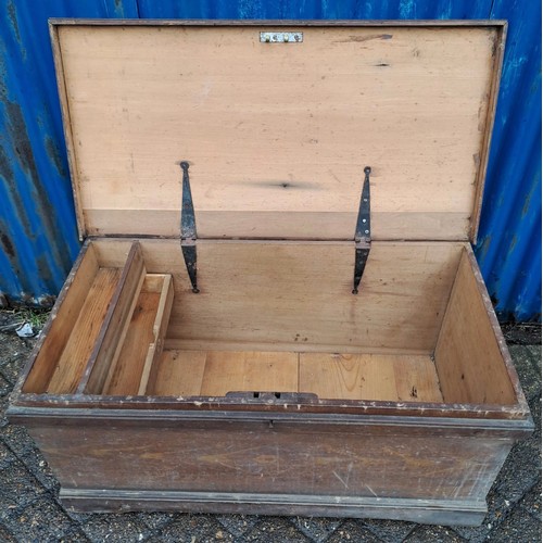 54 - A scrumbled pine box with candle box and drawer to the interior. 95cm w x 48cm d x 44cm h.