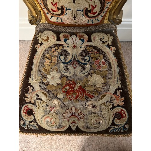 26 - A 19thC giltwood child’s chair with original woolwork tapestry back and seat on cabriole legs. 84cm ... 