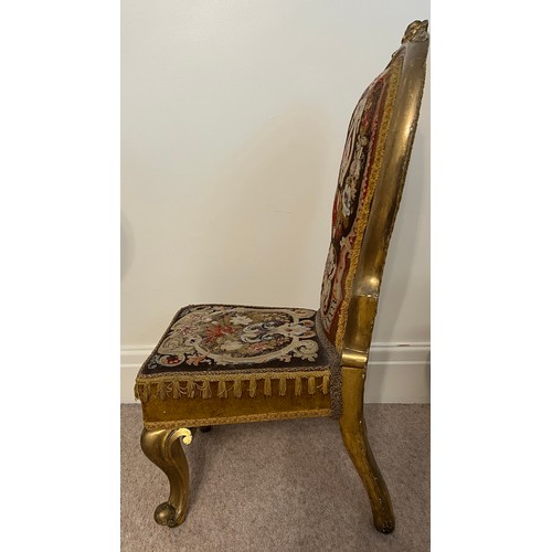 26 - A 19thC giltwood child’s chair with original woolwork tapestry back and seat on cabriole legs. 84cm ... 