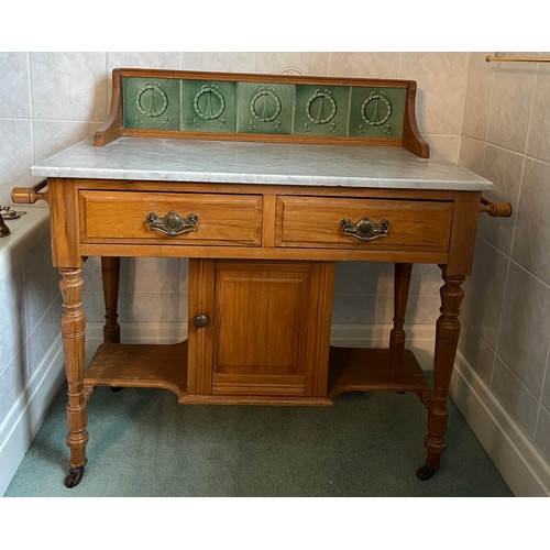 30 - A 19thC beech tile back wash stand with marble top and towel rails to the sides. 91cm h x 105cm w.