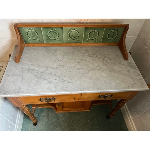 30 - A 19thC beech tile back wash stand with marble top and towel rails to the sides. 91cm h x 105cm w.