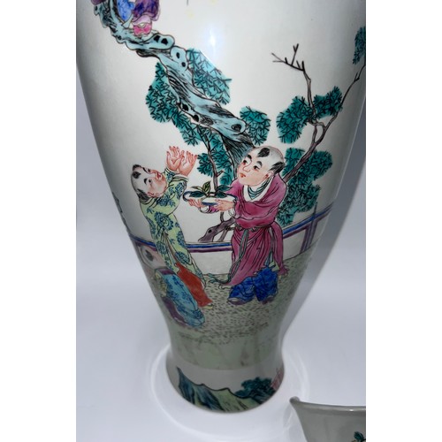 770 - A Chinese famille rose vase with red six character Guangxu mark and probably of the period. 43cm h.