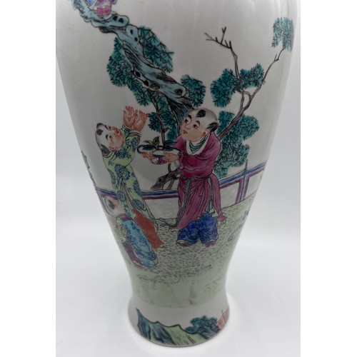 770 - A Chinese famille rose vase with red six character Guangxu mark and probably of the period. 43cm h.