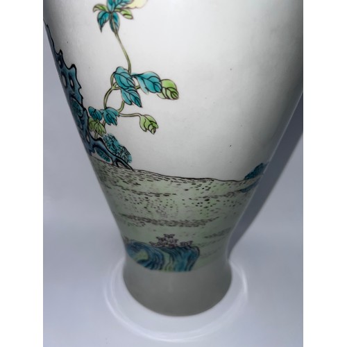 770 - A Chinese famille rose vase with red six character Guangxu mark and probably of the period. 43cm h.