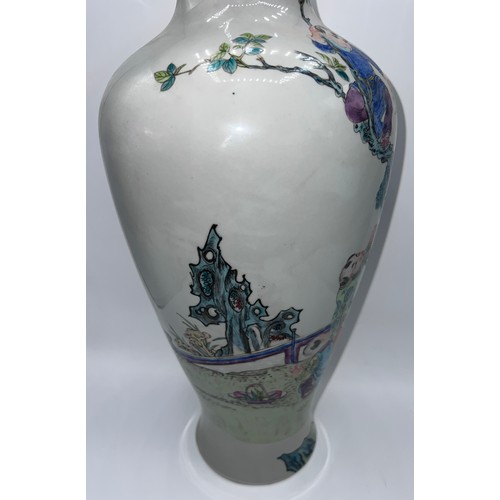 770 - A Chinese famille rose vase with red six character Guangxu mark and probably of the period. 43cm h.