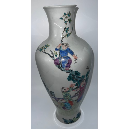 770 - A Chinese famille rose vase with red six character Guangxu mark and probably of the period. 43cm h.