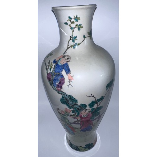 770 - A Chinese famille rose vase with red six character Guangxu mark and probably of the period. 43cm h.