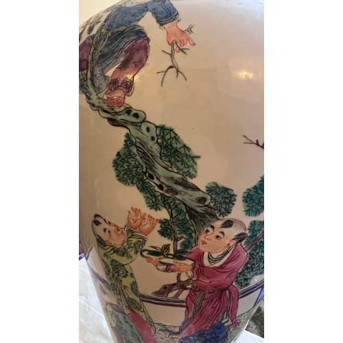 770 - A Chinese famille rose vase with red six character Guangxu mark and probably of the period. 43cm h.