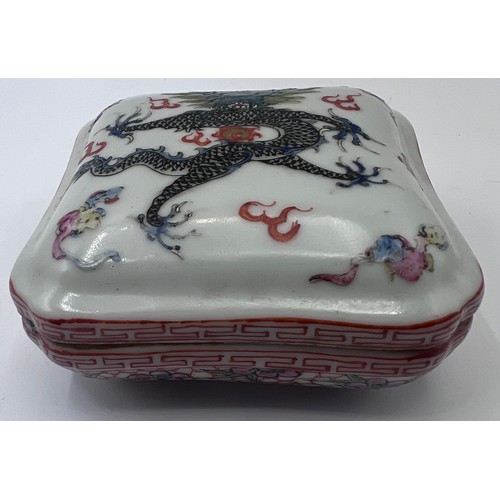 771 - A Chinese small lidded box, flaming pearls and single five clawed dragon with red six character Guan... 