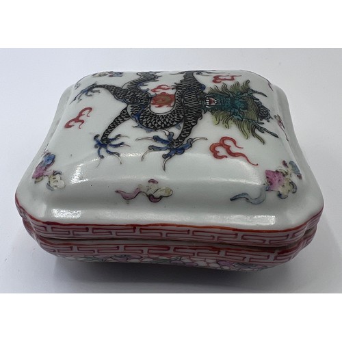 771 - A Chinese small lidded box, flaming pearls and single five clawed dragon with red six character Guan... 