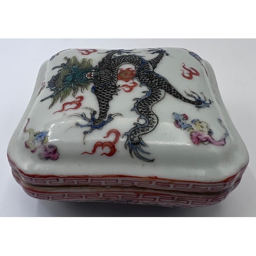 771 - A Chinese small lidded box, flaming pearls and single five clawed dragon with red six character Guan... 