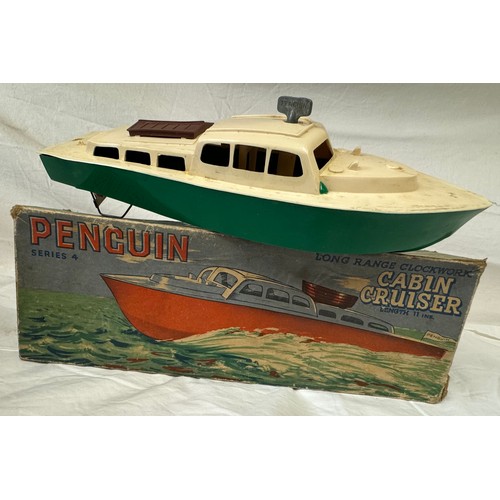 817 - A Penguin clockwork Cabin Cruiser along with four Corgi boxed, unopened, Vintage Glory of Steam mode... 