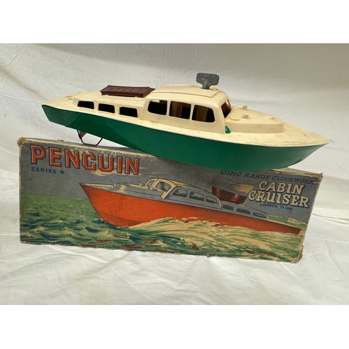 817 - A Penguin clockwork Cabin Cruiser along with four Corgi boxed, unopened, Vintage Glory of Steam mode... 