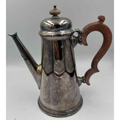 671 - Silver coffee pot with wooden handle and knop, 
19.5cm h. Birmingham 1936, maker Adie Bros. Ltd. Wei... 