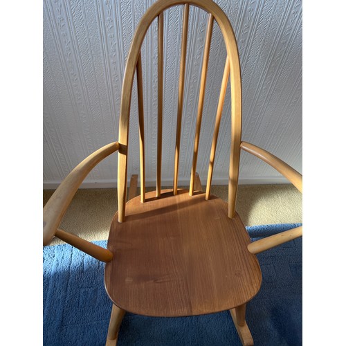 7 - Mid 20thC Ercol rocking chair. 86cm h to back.