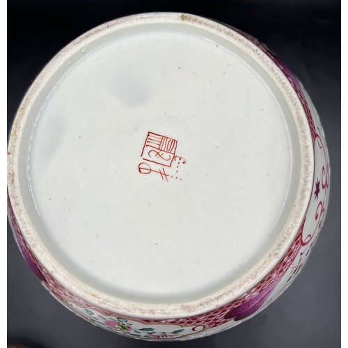 180 - A porcelain lidded vase in the Chinese taste with armorial decoration by Samson of Paris. 29cm h.