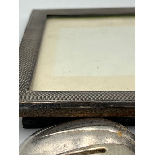 676 - Silver to include frame with engine turned decoration, Birmingham 1926 and a fork and spoon Birmingh... 