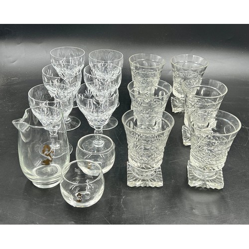 312 - Glass to include six Brierley wine glasses, six cut goblets on square bases and Playboy jug and two ... 