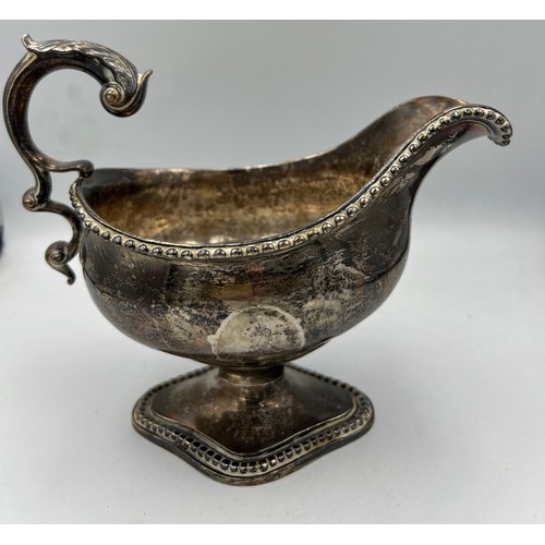 665 - A hallmarked silver jug London 1774, maker TE. 15cm h. Weight 409gm.