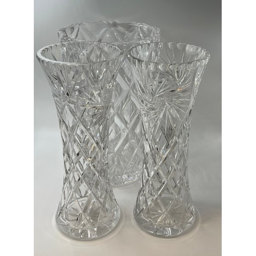 311 - Three good quality cut glass vases, tallest 31cm h.