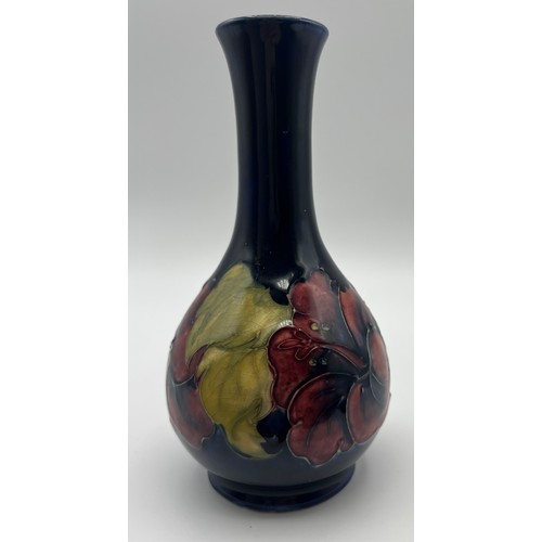 192 - A Moorcroft Hibiscus pattern vase with paper label to base, By Appointment W. Moorcroft Potters to t... 