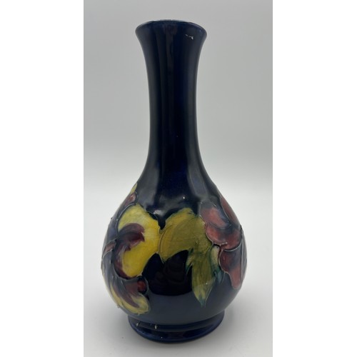 192 - A Moorcroft Hibiscus pattern vase with paper label to base, By Appointment W. Moorcroft Potters to t... 