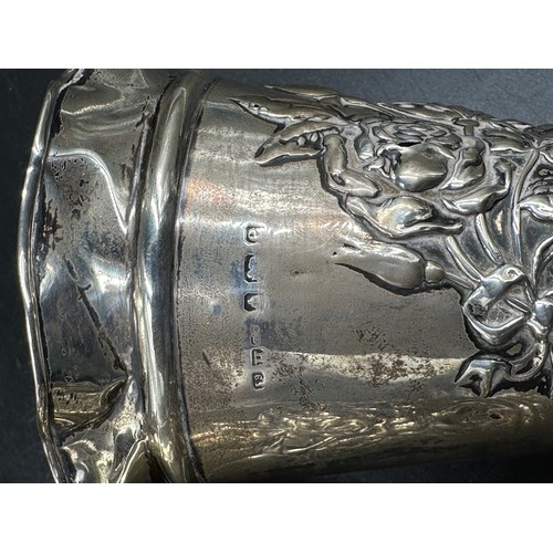 651 - A pair of hallmarked silver pots with floral embellishment, Birmingham 1904, makers marks rubbed, 9.... 