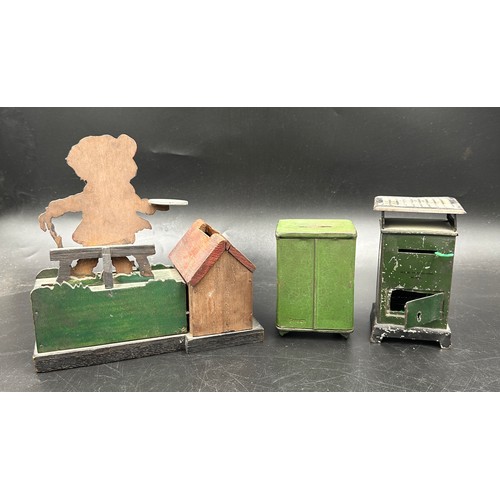 317 - Three vintage money boxes to include two tinplate, Eureka No 410 tinplate stove 13.5cm h, one green ... 