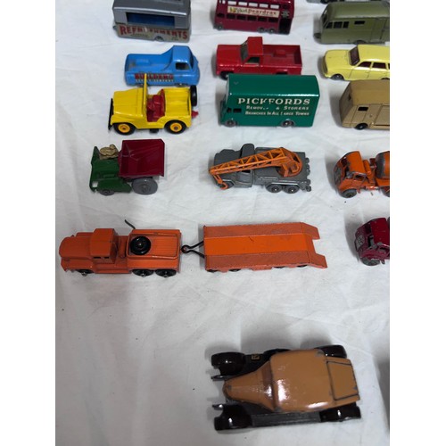 838 - A quantity of mostly Lesney/ Matchbox diecast toys to include various cars, tractors, trucks, buses,... 