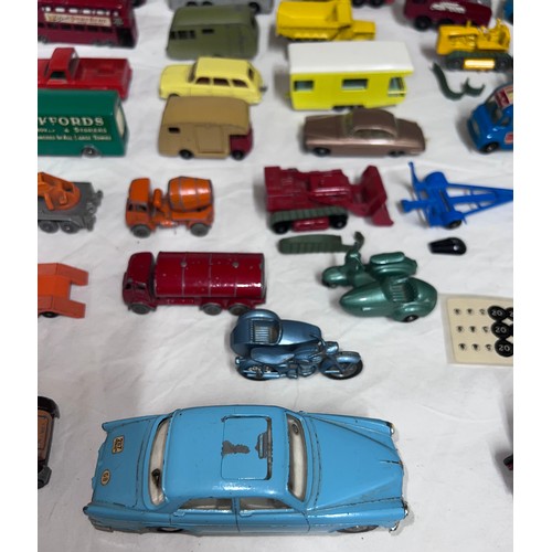 838 - A quantity of mostly Lesney/ Matchbox diecast toys to include various cars, tractors, trucks, buses,... 