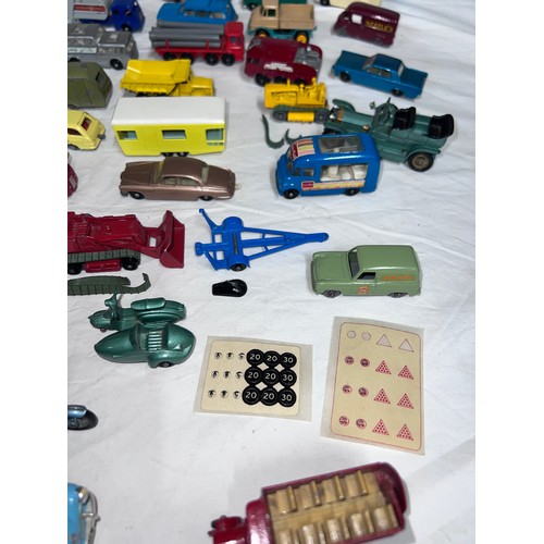 838 - A quantity of mostly Lesney/ Matchbox diecast toys to include various cars, tractors, trucks, buses,... 