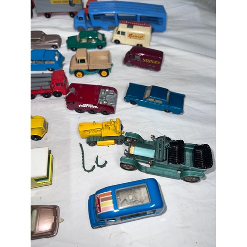 838 - A quantity of mostly Lesney/ Matchbox diecast toys to include various cars, tractors, trucks, buses,... 