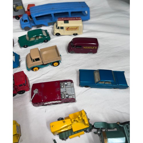 838 - A quantity of mostly Lesney/ Matchbox diecast toys to include various cars, tractors, trucks, buses,... 