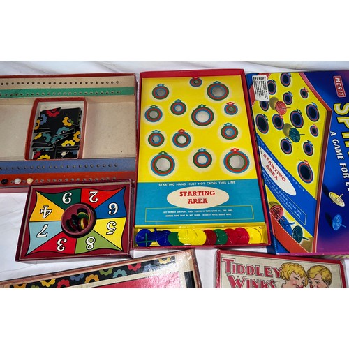 839 - Board games to include Spintops, Daisy Chain and Tiddley Winks.