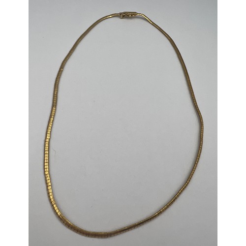 357 - A 18 carat yellow gold smooth link necklace. Length 42cm. Weight 16.8gm.