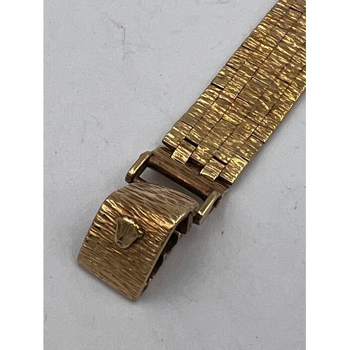 536 - A 9 carat gold cased ladies Rolex wristwatch with 9ct gold bracelet. 16cm l. Total weight 25.4gm.