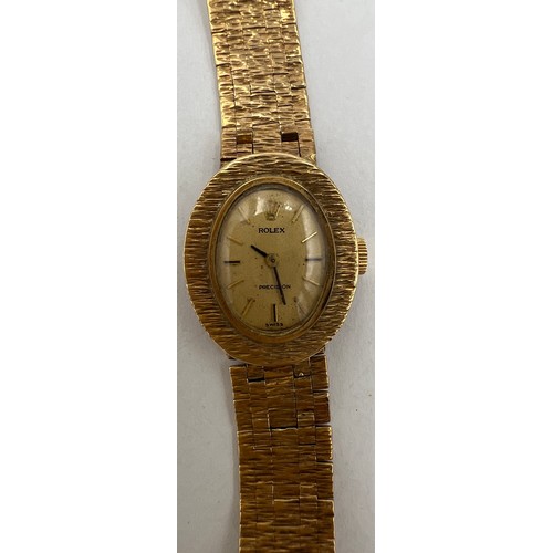 536 - A 9 carat gold cased ladies Rolex wristwatch with 9ct gold bracelet. 16cm l. Total weight 25.4gm.