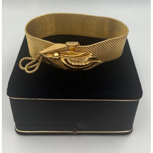 413 - A yellow metal bracelet in original presentation box. Length 22.5cm. Weight 69.3gm. Tests as approxi... 