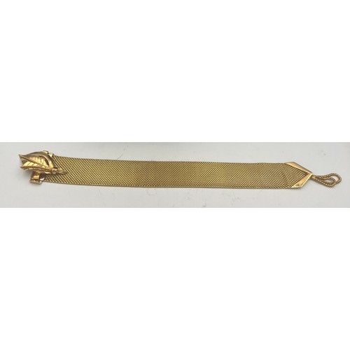 413 - A yellow metal bracelet in original presentation box. Length 22.5cm. Weight 69.3gm. Tests as approxi... 