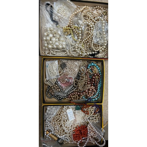 375 - A large quantity of cultured and simulated pearl necklaces, coral etc.