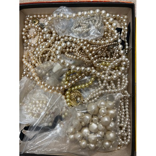 375 - A large quantity of cultured and simulated pearl necklaces, coral etc.