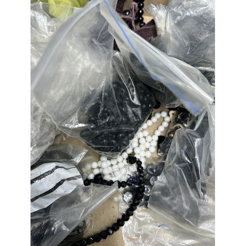 377 - A very large quantity of jet and French jet jewellery to include beads, bracelets, chains etc