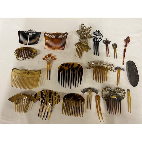 393 - A quantity of 19thC hair combs and decorations to include tortoiseshell. Many with hinged decoration... 