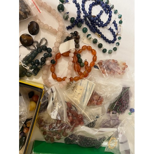 399 - Two boxes of vintage hardstone beads, necklaces etc to include moss agate, amethyst, malachite etc.